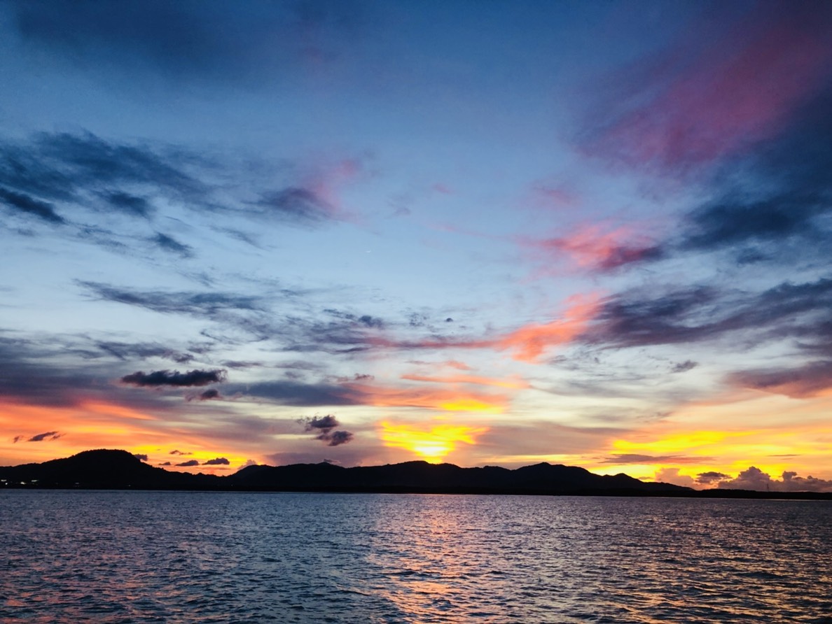 sunset on a yacht charter in phuket